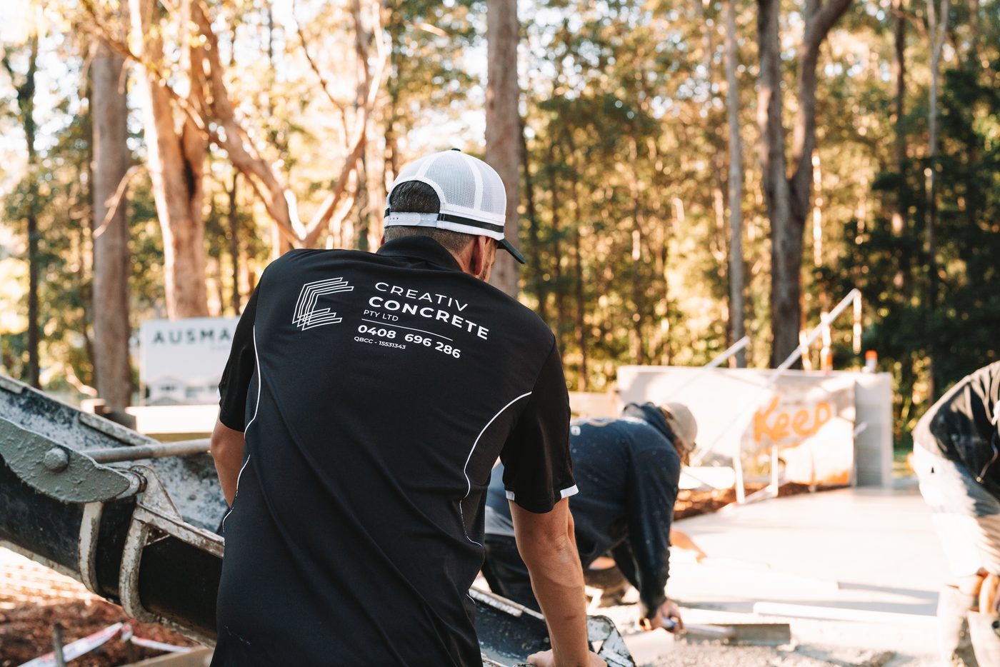 Creativ Concrete Co. branded work shirt on site