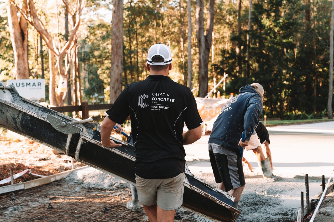 The crew working the chute in Creativ Concrete shirts