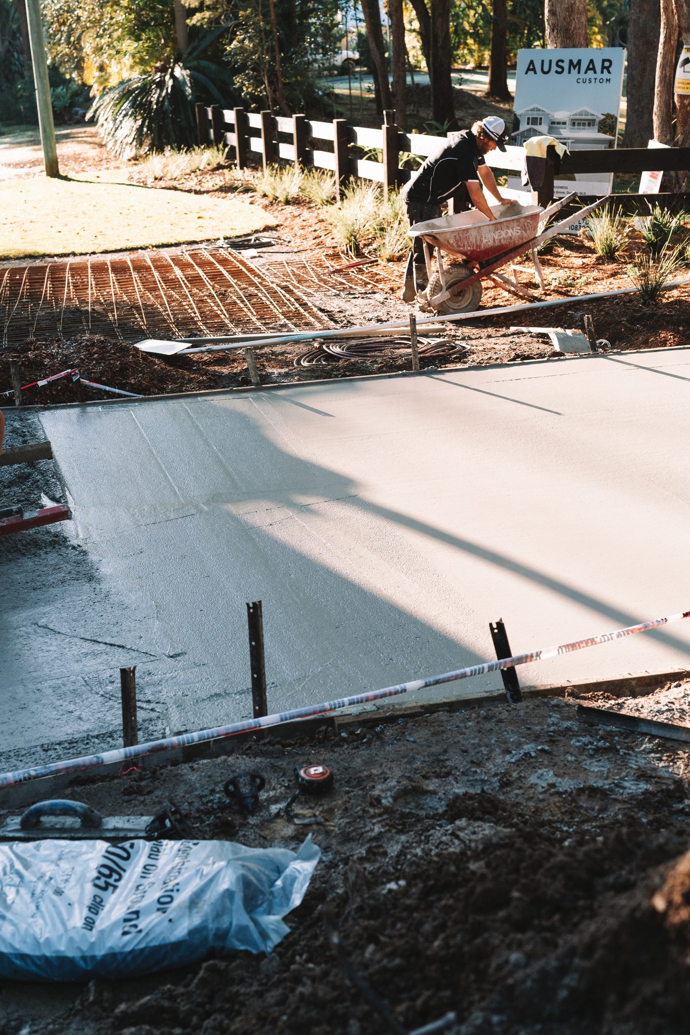 Screeding a fresh residential slab