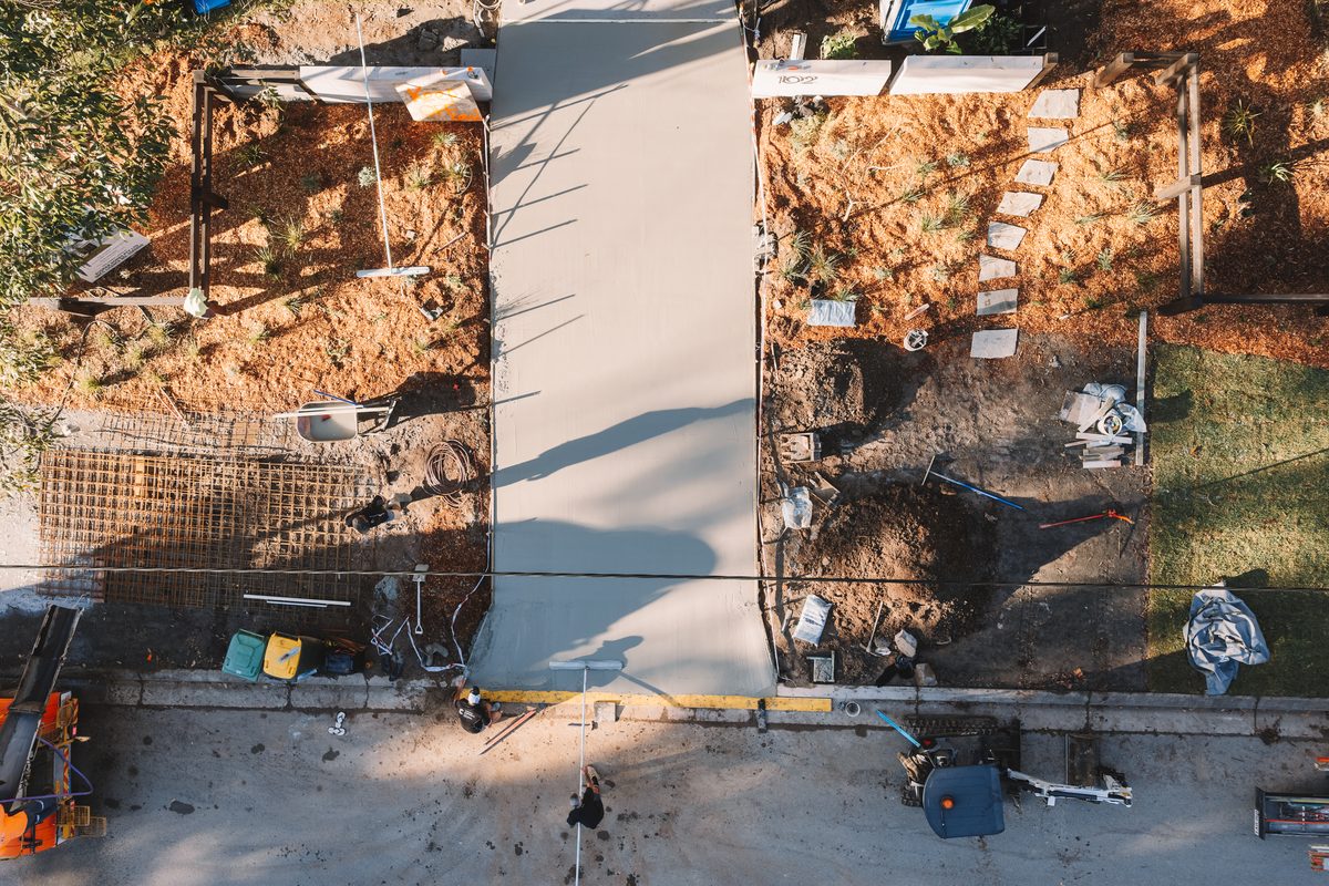 Aerial view of a slab pour underway