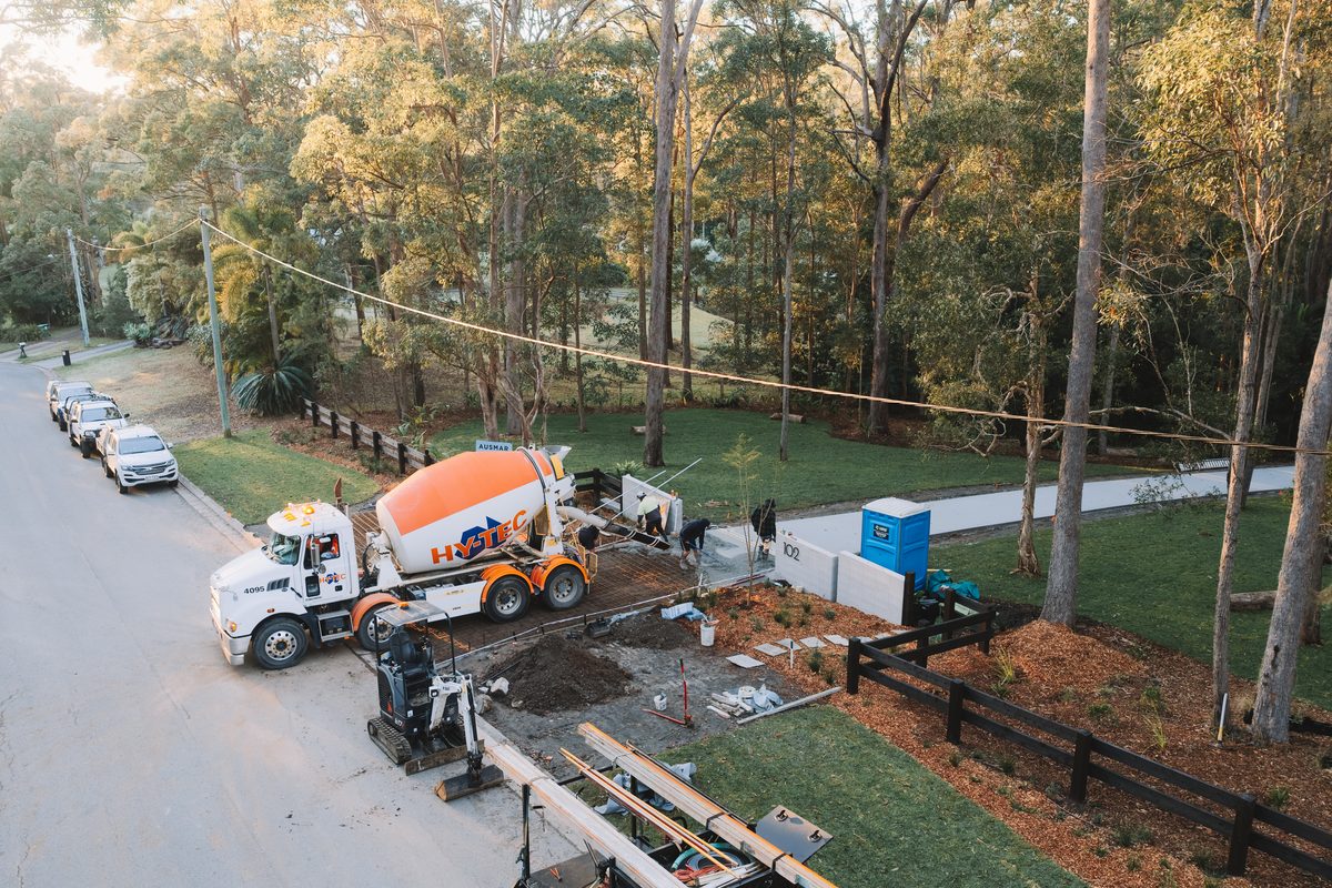 Concrete truck and crew set up on a new build site